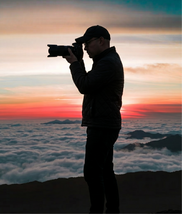 David Fugate silhouette with camera